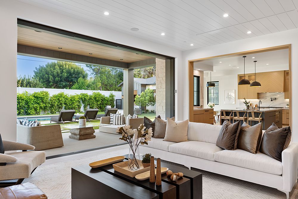 Indoor outdoor living at its best. Open up sliding glass walls and the patio becomes part of the living room.
