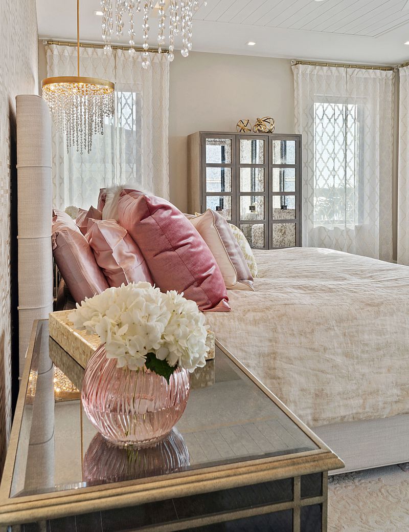 A pretty bedroom clearly demonstrates the joy of layering textiles.