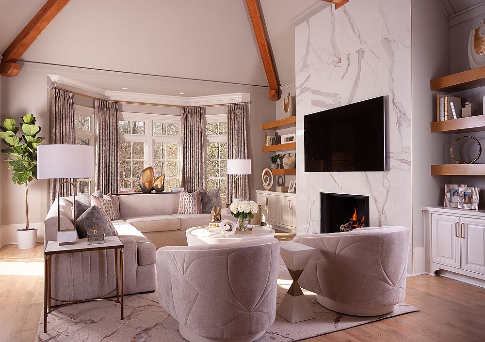 Universal Khaki, Sherwin-Williams 2026 Color of the Year, is shown in this warm living room.